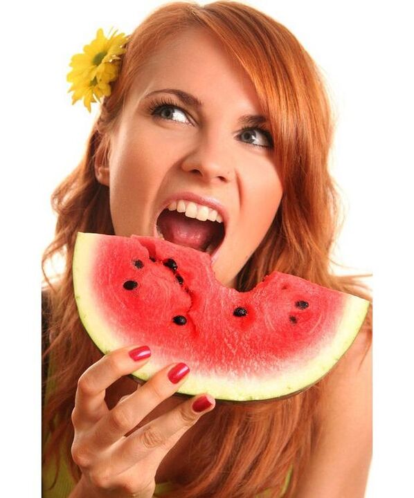 the girl eats watermelon on a watermelon diet